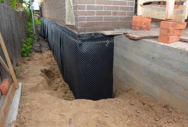 SJ Waterproofing Pros technician performing targeted Sump Pump Installation assessment in Salem, NC